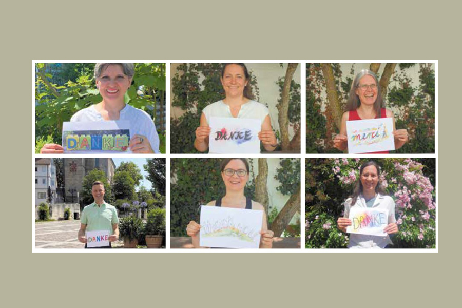 6 Personen mit einem Schild in der Hand auf dem das Wort DANKE steht